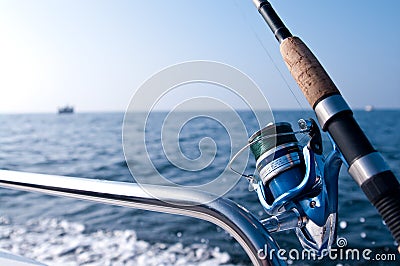 Fishing road on boat at sea Stock Photo