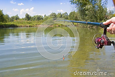 Fishing with rod Stock Photo