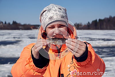 Fishing rod for winter fishing in the snow Stock Photo