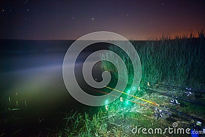 Fishing rods at night Stock Photo