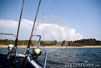 Fishing rods at sea. Stock Photo