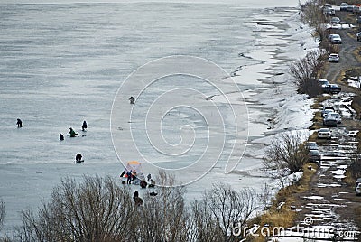 Fishing on Siberian ice Stock Photo