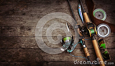 Fishing tackle composition, wood background. Stock Photo