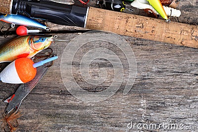 Fishing tackle on a wooden table Stock Photo