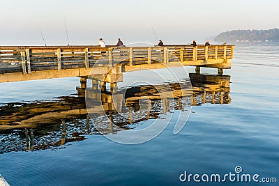 Fishing On Wooden Pier Editorial Stock Photo