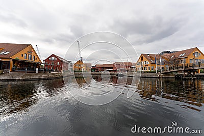 Fiskebrygga in Kristiansand, beautiful colorful houses, Norway Stock Photo