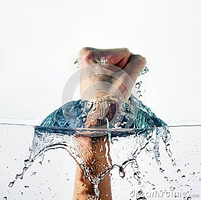 Fist Punching Water Stock Photo