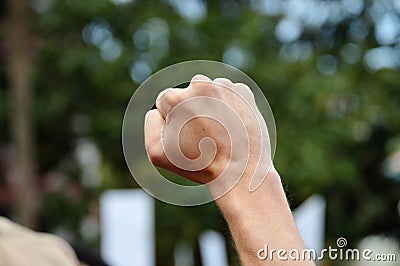 Fist Raised in Protest Stock Photo