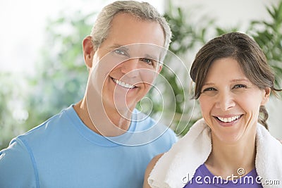 Fit Couple Smiling Outdoors Stock Photo