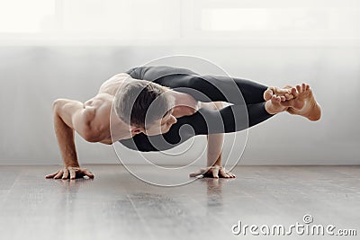 Flexible man exercising Stock Photo