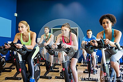 Fit people in a spin class Stock Photo