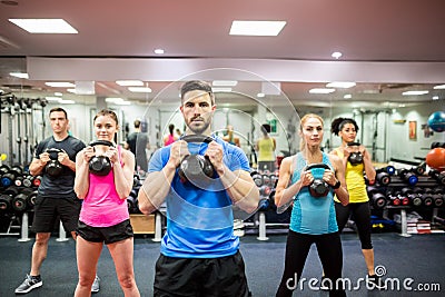 Fit people working out in fitness class Stock Photo