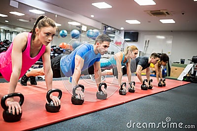 Fit people working out in fitness class Stock Photo