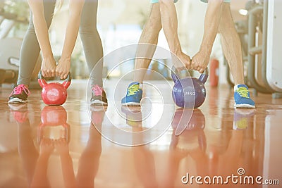 Fit people working out in fitness class at the gym Stock Photo