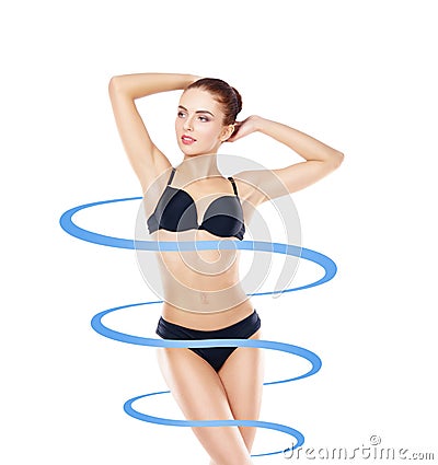 Fit and slender girl in swimsuit. Perfect female shape. Medicine, weight loss, fat burn and healthcare concept. Stock Photo