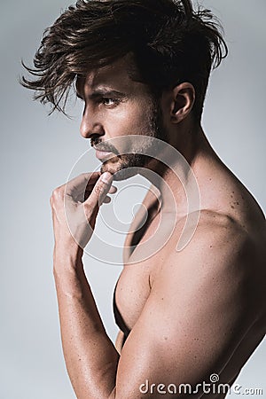 Fit thinking man profile Stock Photo