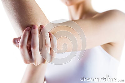 Fit woman with elbow injury Stock Photo