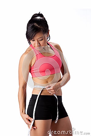 Fit Woman with Tape Measure Stock Photo