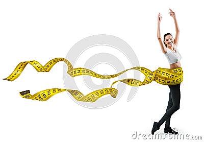 Fit young woman with a large measuring tape Stock Photo