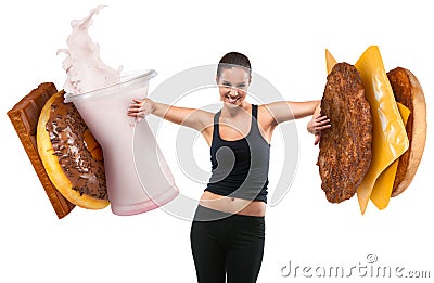 Fit young woman pushing fast food Stock Photo