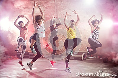 Fit young women dancing and exercising Stock Photo