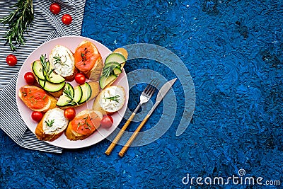 Fitness breskfast with homemade sandwiches on blue background top view mockup Stock Photo