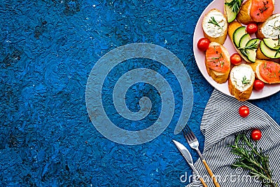 Fitness breskfast with homemade sandwiches on blue background top view mockup Stock Photo