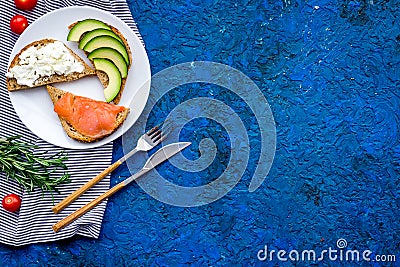 Fitness breskfast with homemade sandwiches on blue background top view mockup Stock Photo