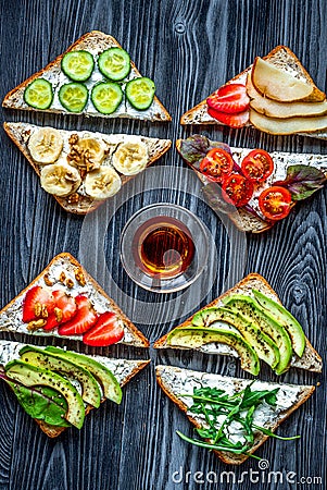 fitness breskfast with homemade sandwiches dark table background top view Stock Photo