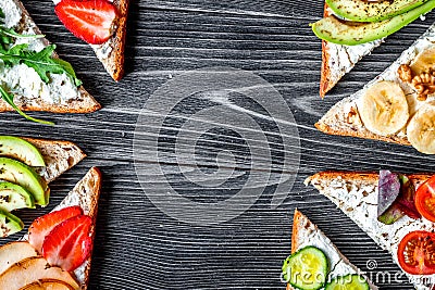 Fitness breskfast with homemade sandwiches dark table background top view mock up Stock Photo
