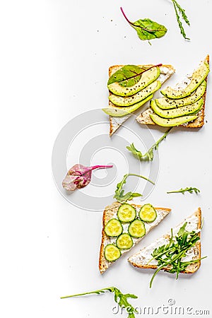 Fitness breskfast with homemade sandwiches white table background top view mock up Stock Photo