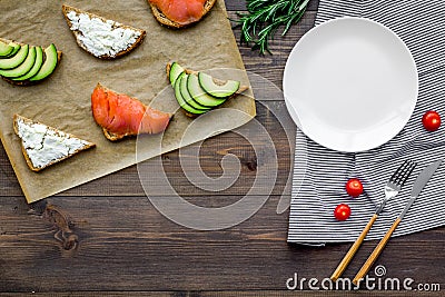 Fitness breskfast with homemade sandwiches on wooden background top view mockup Stock Photo