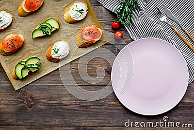 Fitness breskfast with homemade sandwiches on wooden background top view mockup Stock Photo