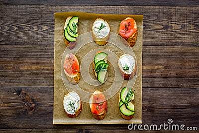 Fitness breskfast with homemade sandwiches on wooden background top view mockup Stock Photo