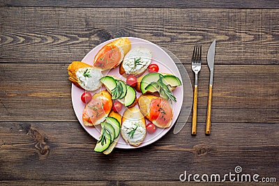 Fitness breskfast with homemade sandwiches on wooden background top view mockup Stock Photo