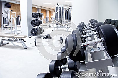 Fitness club weight training equipment gym Stock Photo