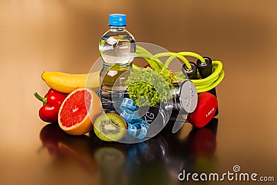 Fitness equipment and healthy food Stock Photo