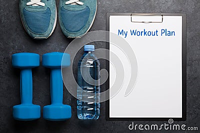 Fitness equipment and sheet for workout plan Stock Photo