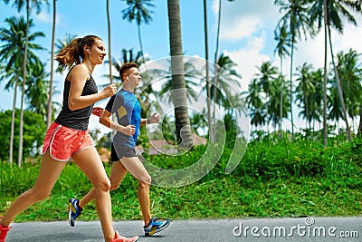 Fitness. Fit Athletic Couple Running. Runners Jogging. Sports. H Stock Photo