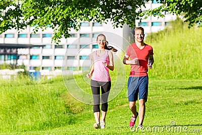 Fitness Friends running together Stock Photo