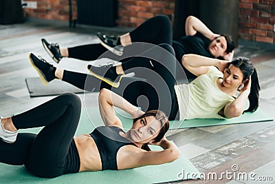Group of women working out at the gym Stock Photo