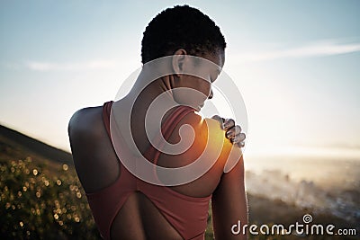 Fitness injury, black woman and exercise outdoor with shoulder pain overlay, glow and city view. Athlete, wellness and Stock Photo