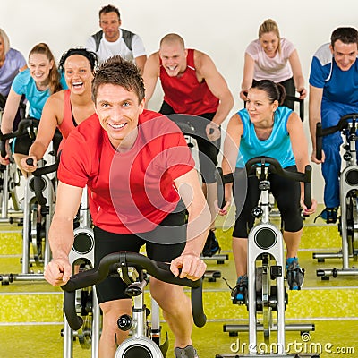 Fitness instructor with spinning class Stock Photo