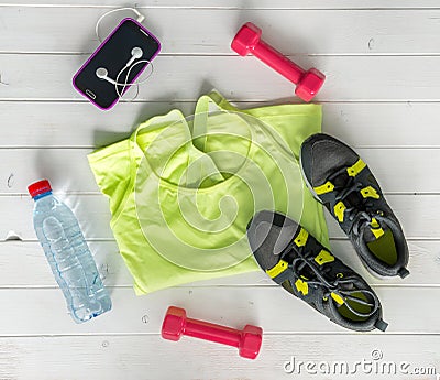 Fitness items on wooden planks background Stock Photo