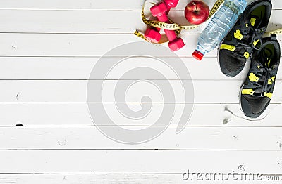 Fitness items on wooden planks background with Stock Photo