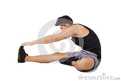 Fitness man sitting and making stretching Stock Photo