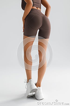 Fitness model in cycling shorts with beautiful buttocks. Sporty booty Stock Photo