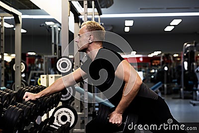 Fitness parners in sportswear doing exercises at gym. Fitness sport gym concept Stock Photo