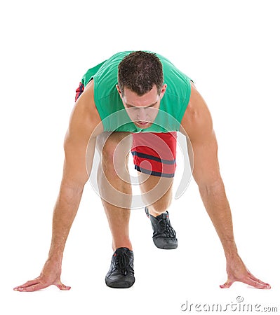 Fitness runner in ready to start position Stock Photo