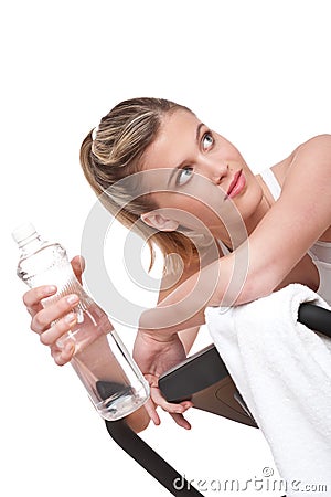 Fitness series - Woman with exercise bike Stock Photo
